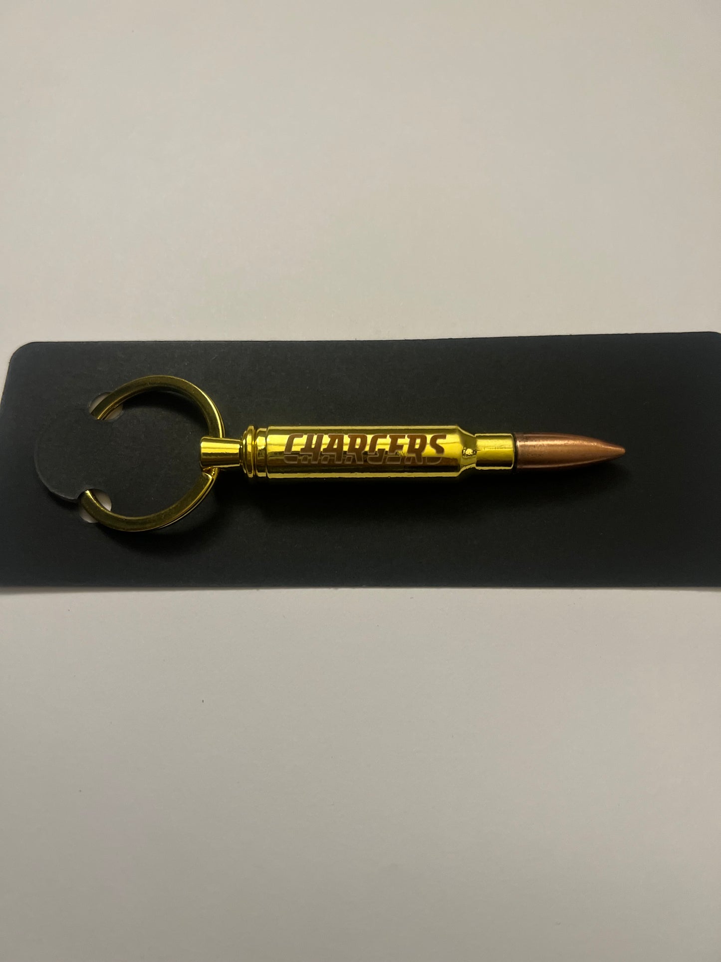 Chargers bullet bottle opener keychain