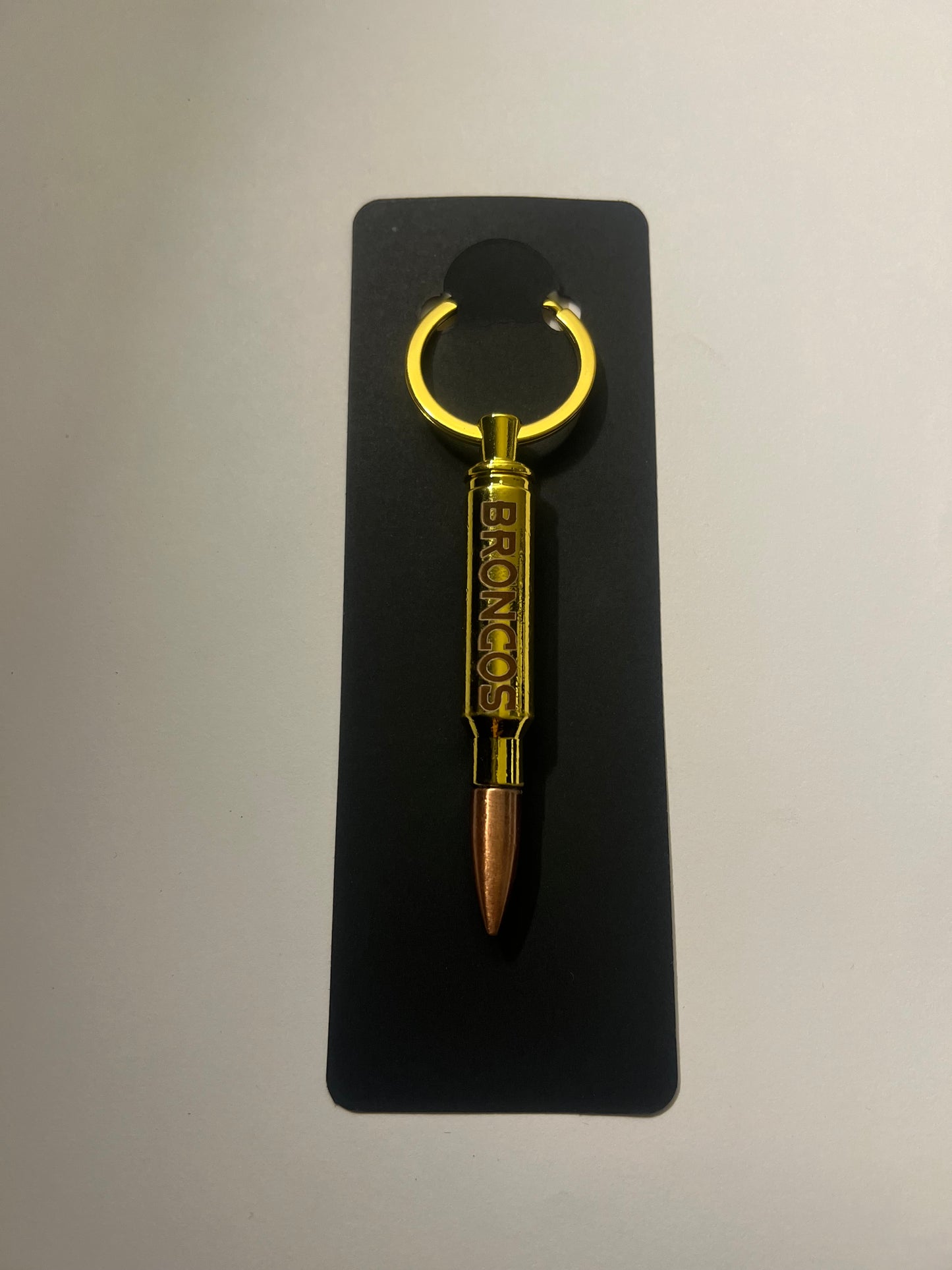 Broncos bullet bottle opener keychain