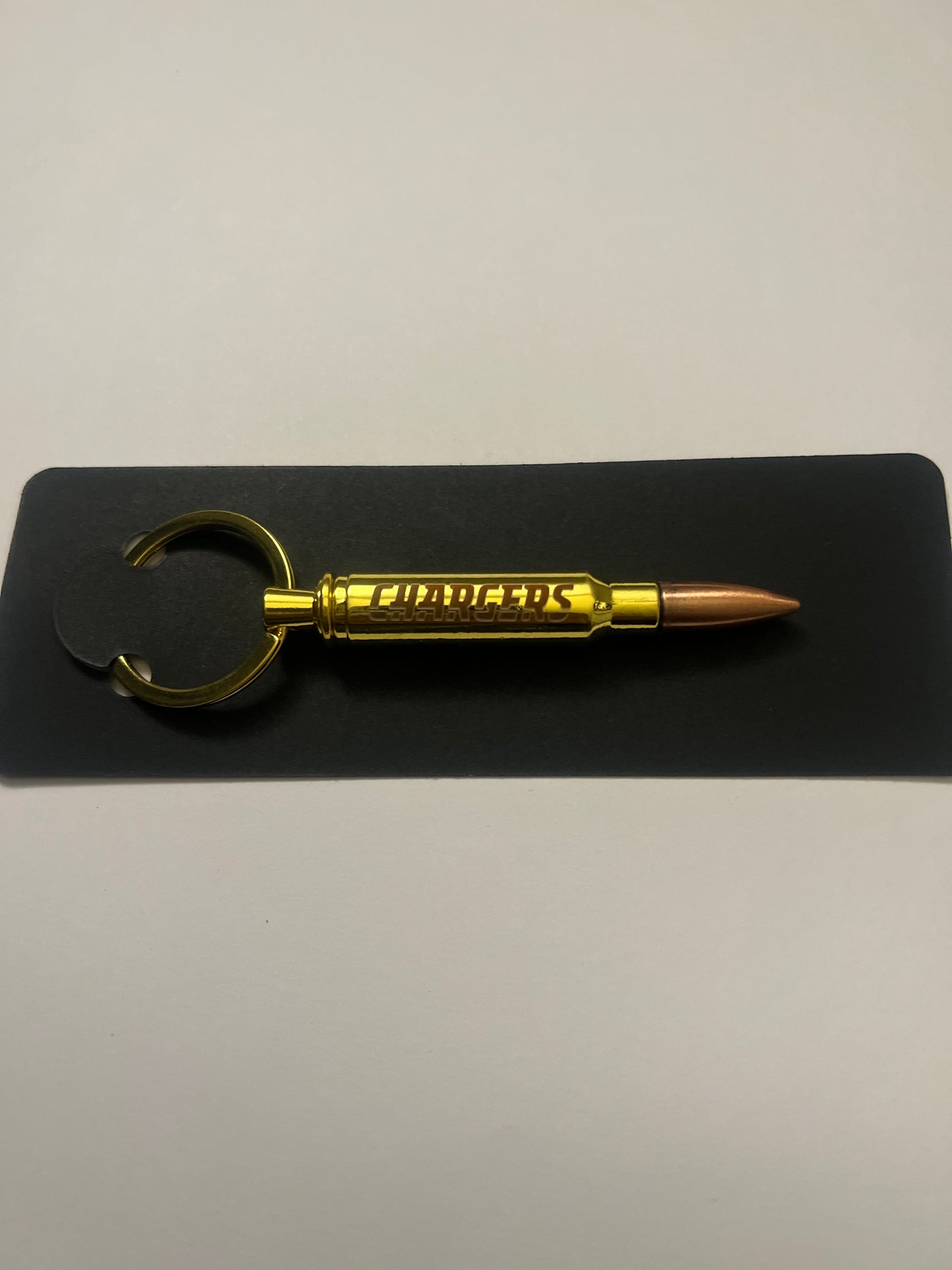 Chargers bullet bottle opener keychain