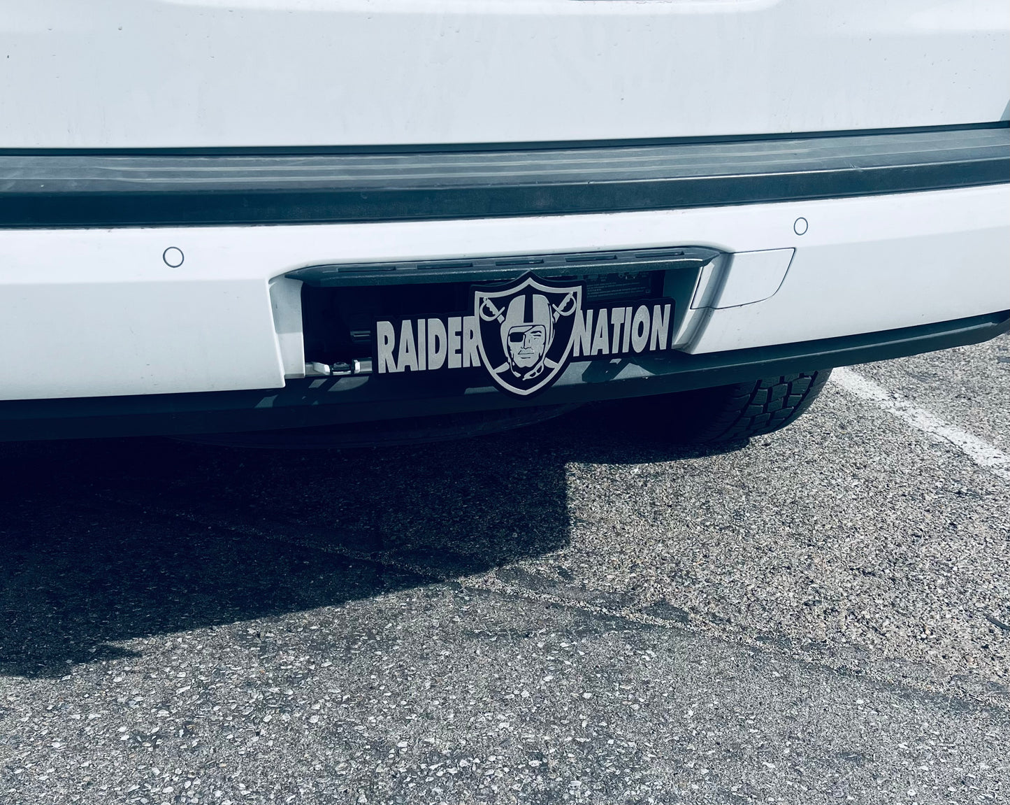 Chrome Raider nation font shield hitch cover