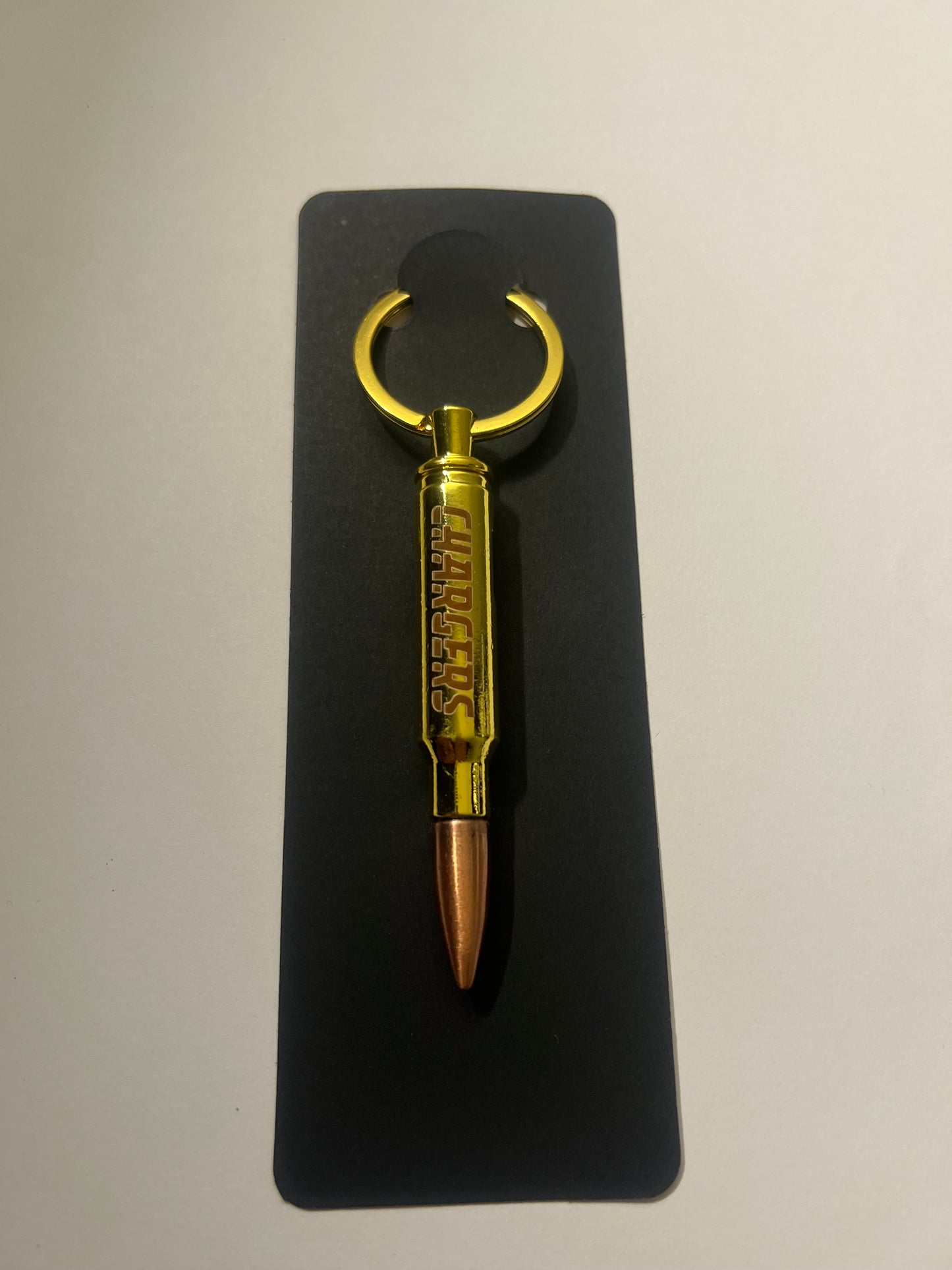 Chargers bullet bottle opener keychain