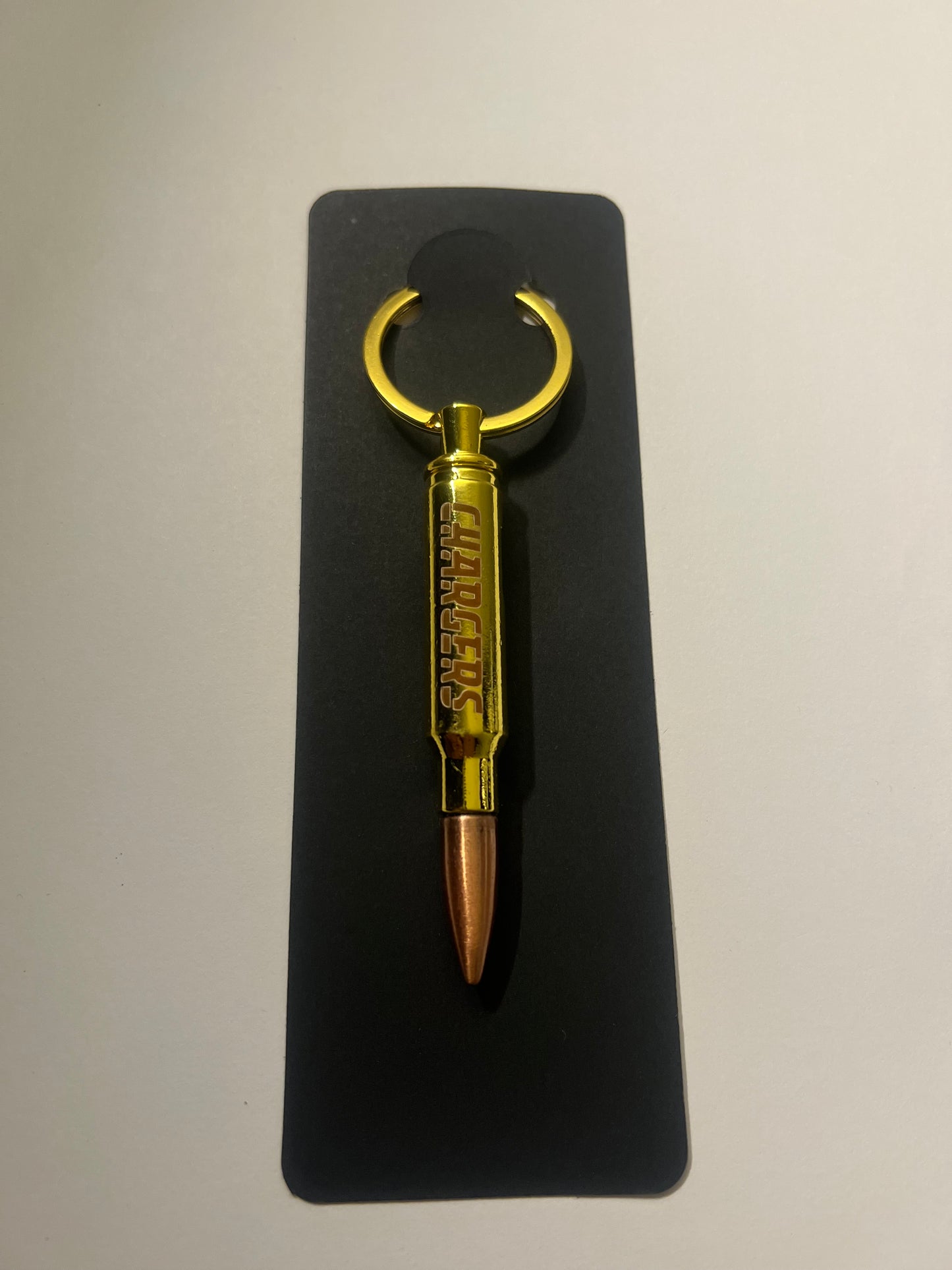 Chargers bullet bottle opener keychain