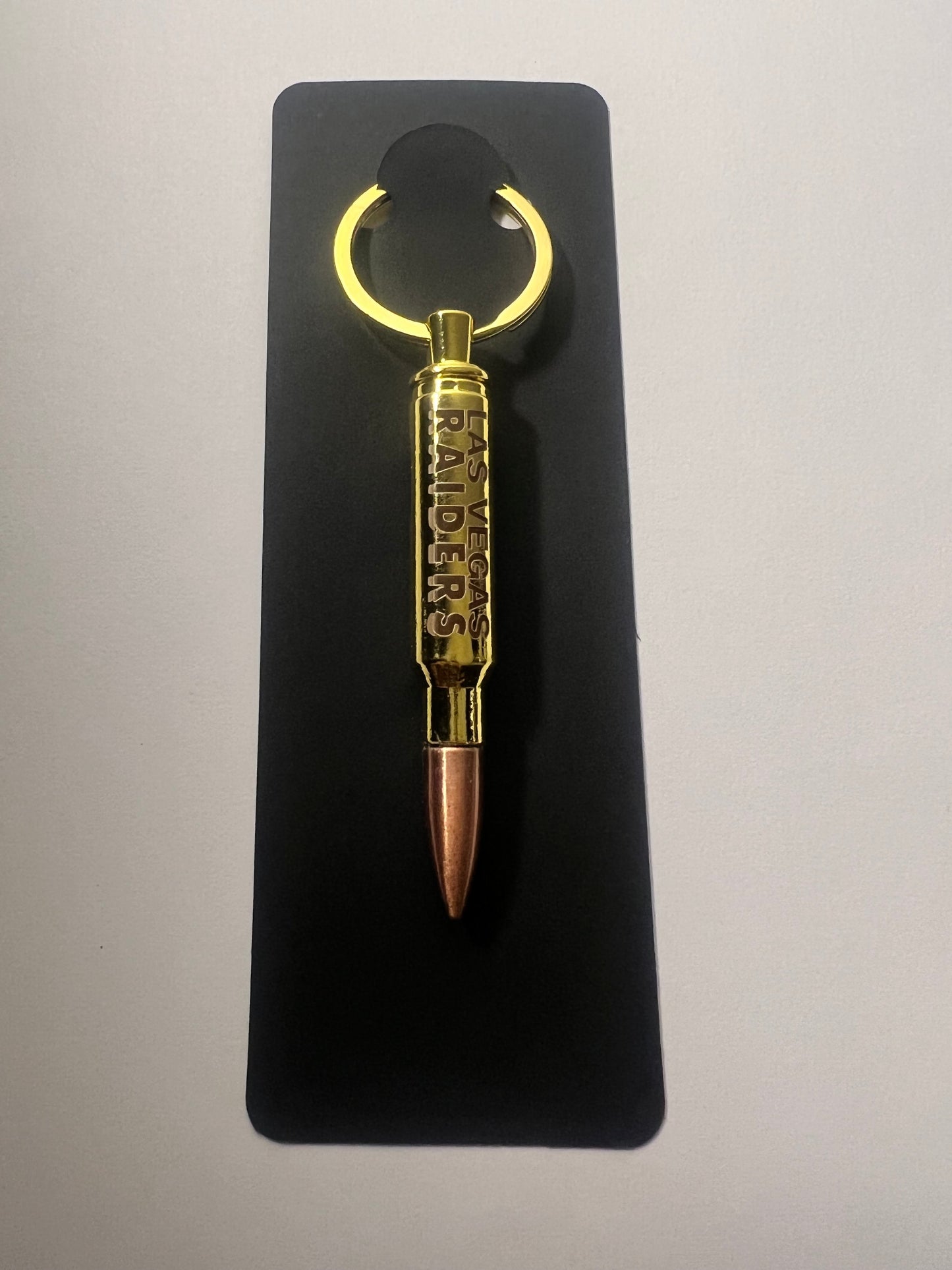 Las Vegas raiders bullet bottle opener keychain