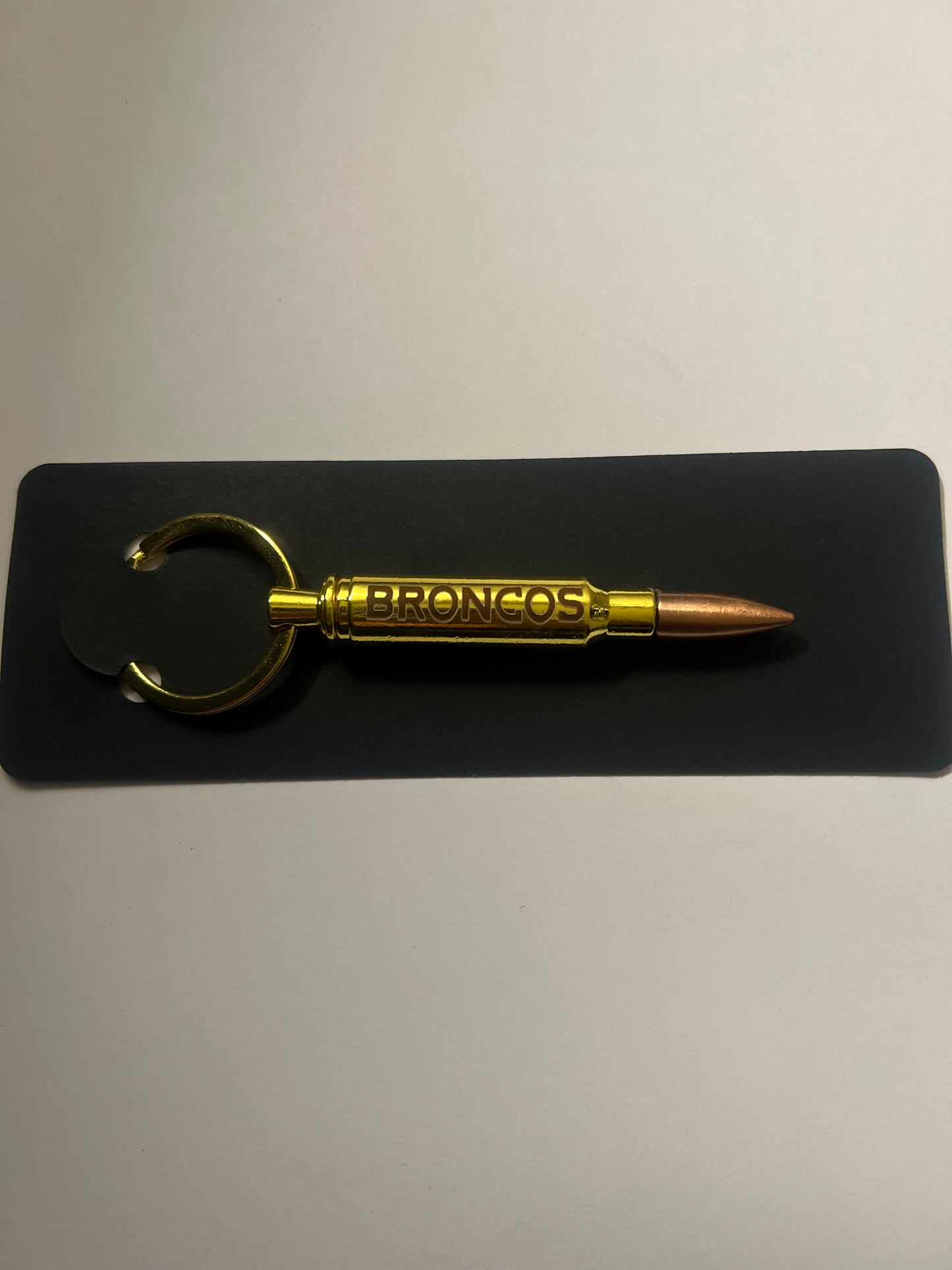 Broncos bullet bottle opener keychain