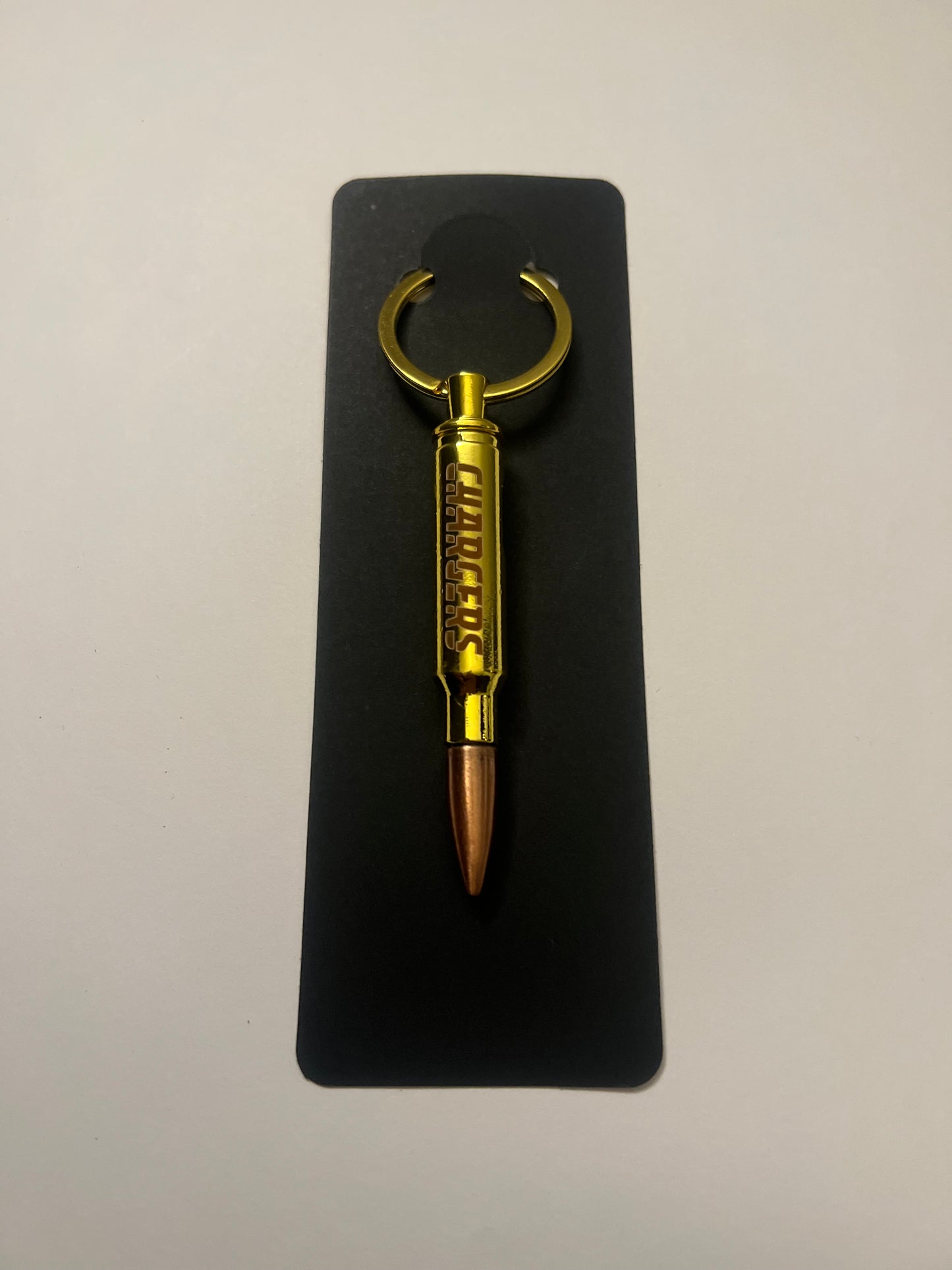 Chargers bullet bottle opener keychain