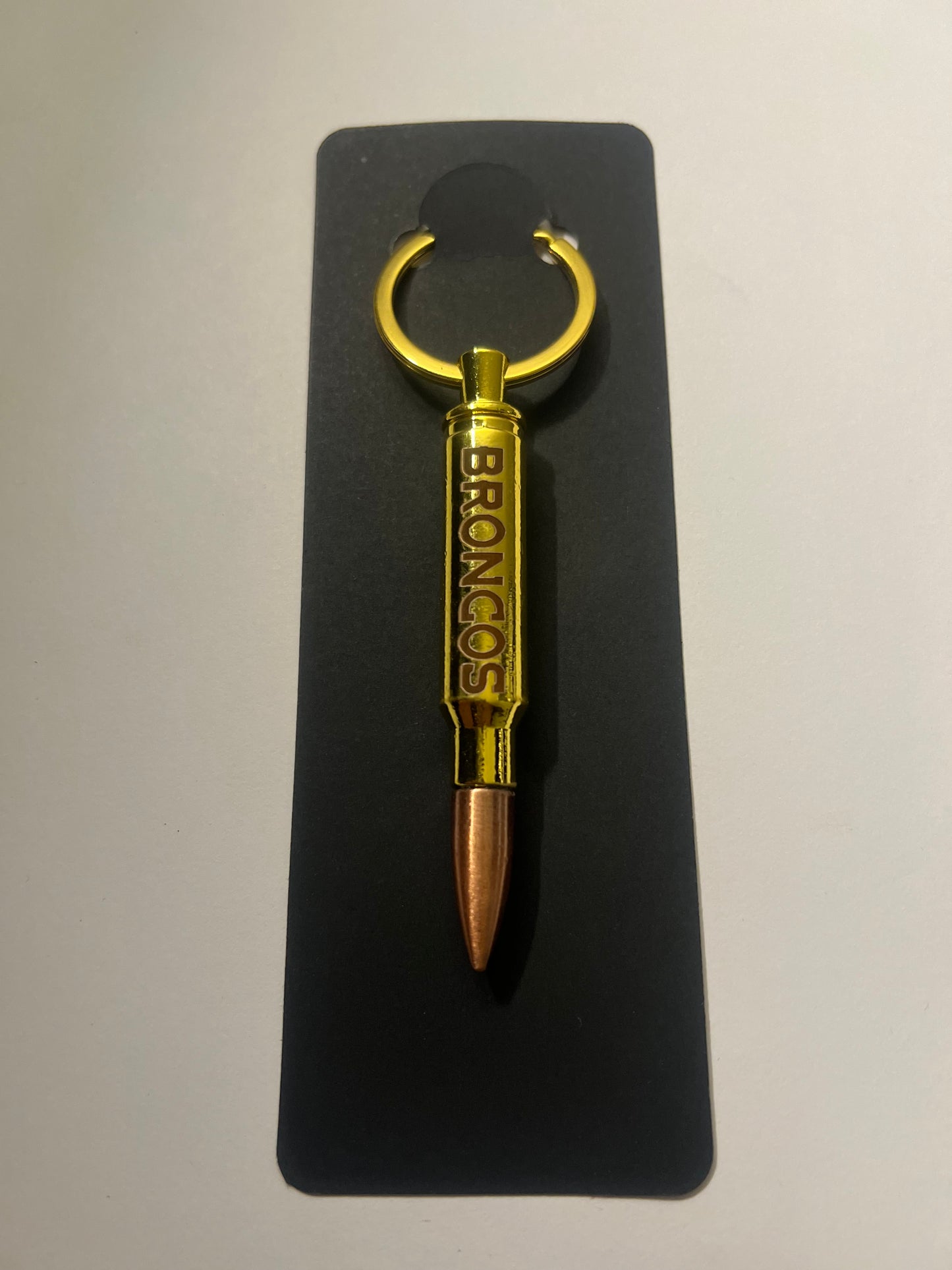 Broncos bullet bottle opener keychain