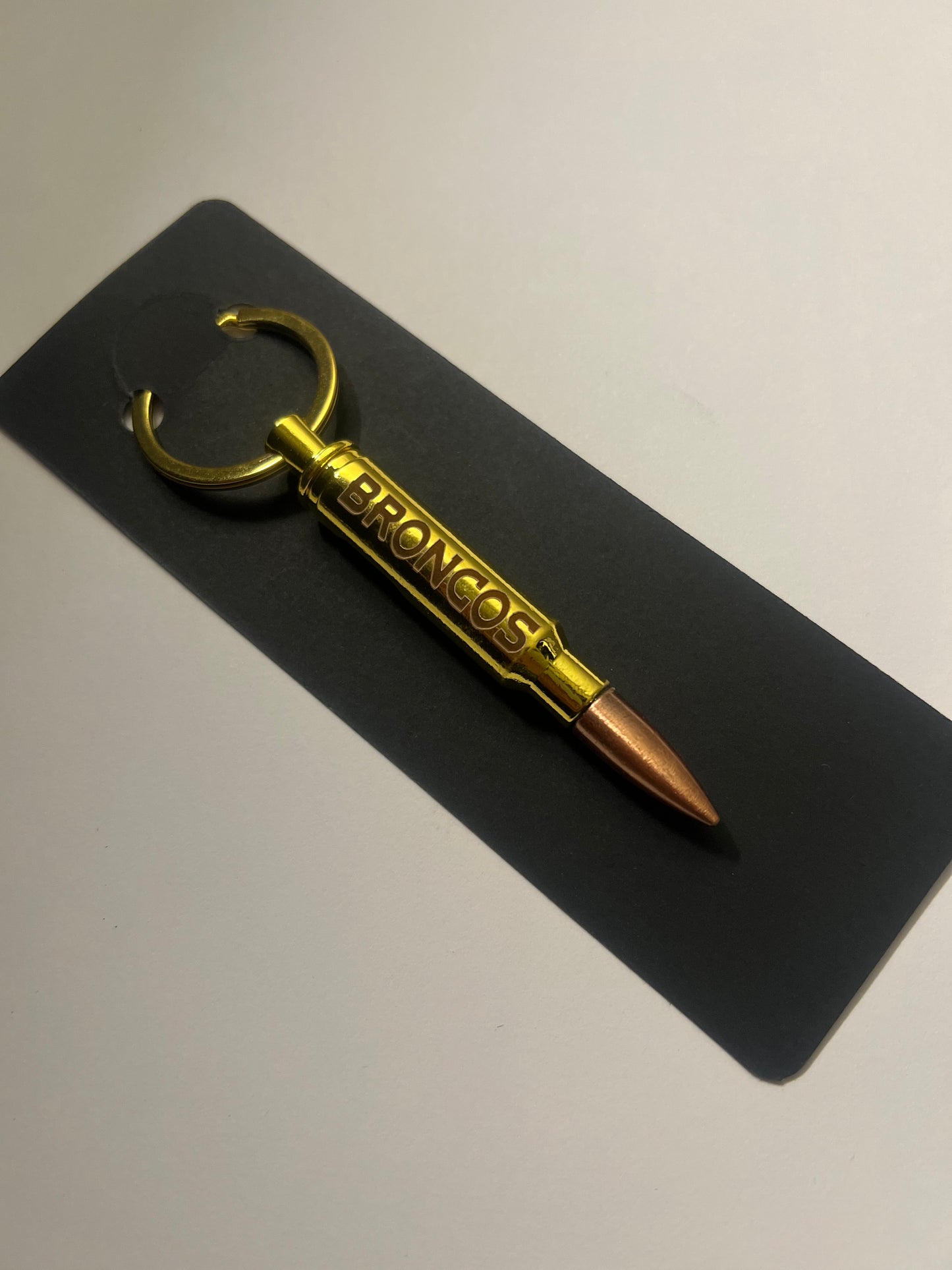 Broncos bullet bottle opener keychain